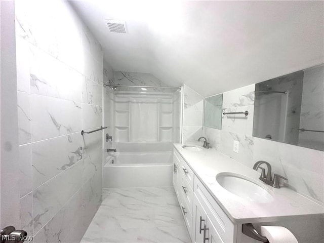 bathroom with vanity and tub / shower combination