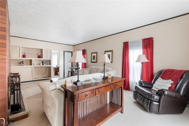 carpeted living room featuring a textured ceiling