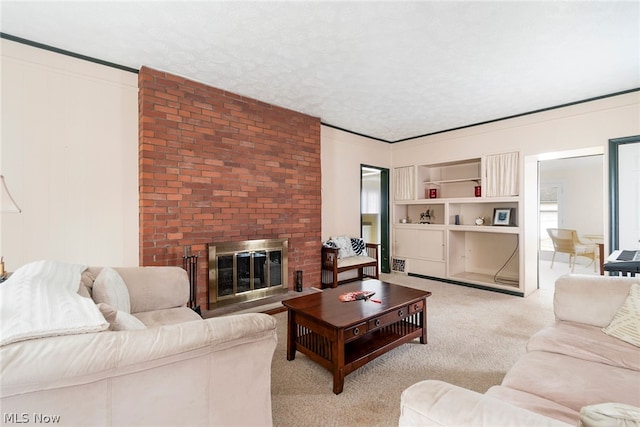 living room with light carpet, a textured ceiling, and a brick fireplace