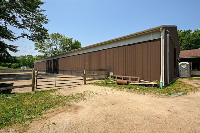 view of stable with an outbuilding