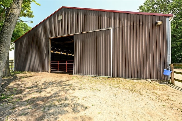 view of horse barn featuring an outdoor structure