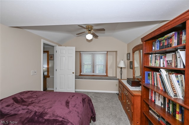 bedroom featuring carpet floors, ceiling fan, and vaulted ceiling