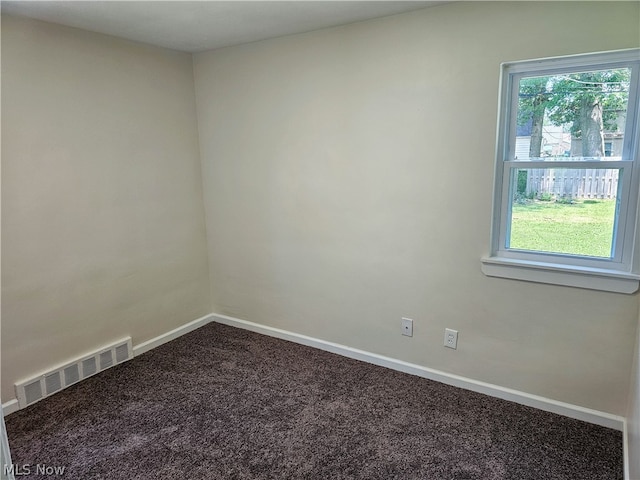 unfurnished room featuring carpet floors