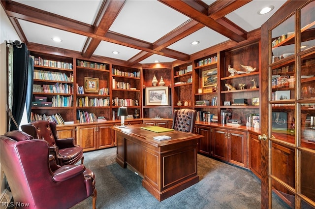 carpeted office space featuring beamed ceiling, coffered ceiling, and built in features