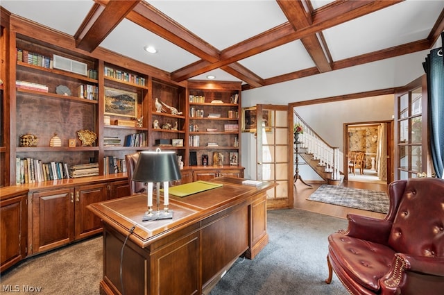 office space with french doors, beamed ceiling, built in shelves, coffered ceiling, and carpet flooring