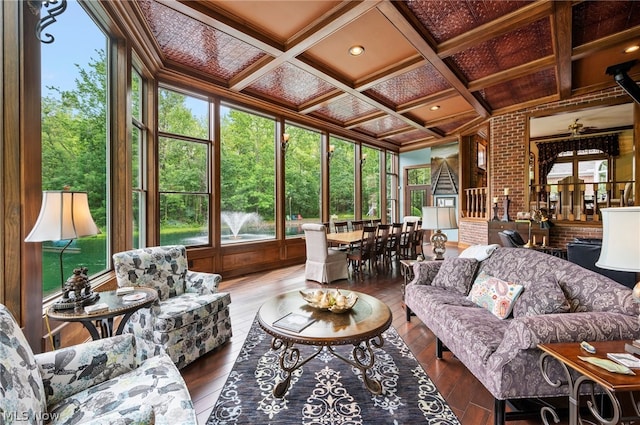 sunroom / solarium with beamed ceiling and coffered ceiling