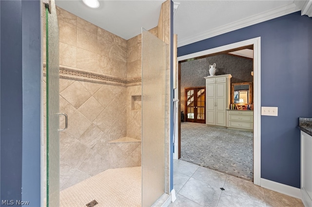 bathroom with crown molding, tile flooring, an enclosed shower, and vanity