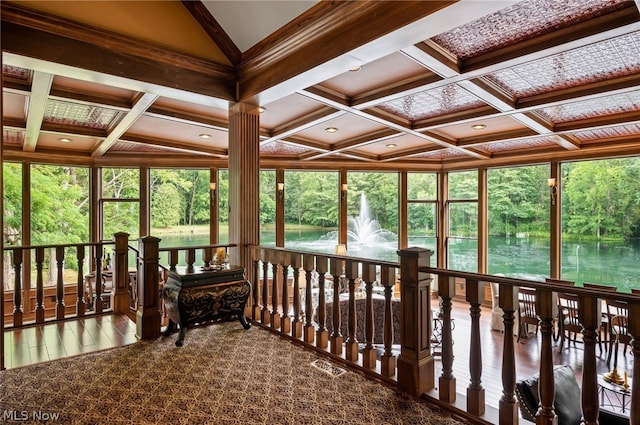 unfurnished sunroom with vaulted ceiling with beams and coffered ceiling