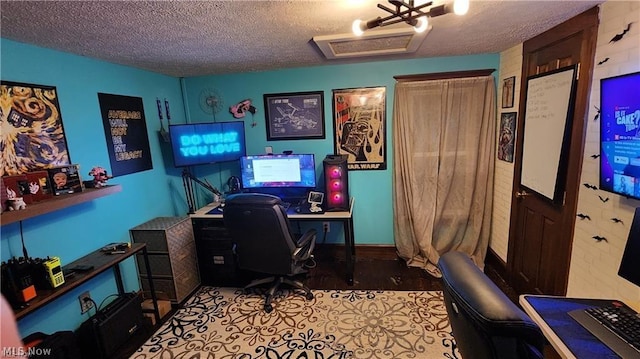 office space featuring a textured ceiling