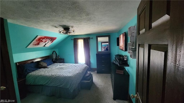 bedroom featuring lofted ceiling, carpet, and a textured ceiling