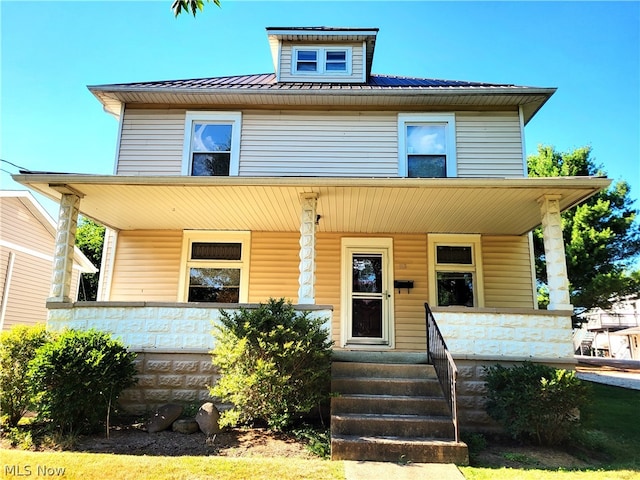 view of front of house with covered porch