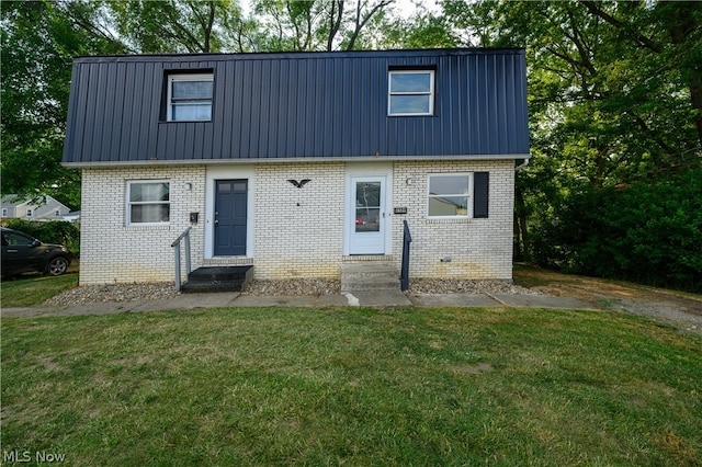 view of front facade with a front lawn