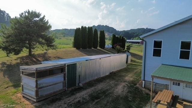 exterior space featuring a mountain view