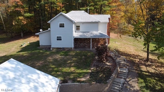 exterior space featuring a yard