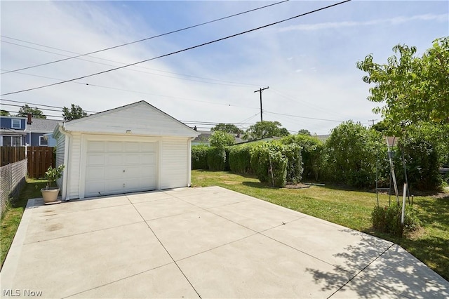 garage with a lawn