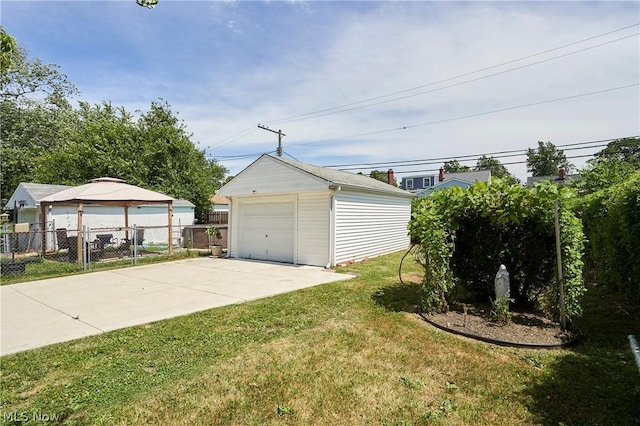 garage with a yard