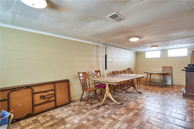 dining space with a textured ceiling