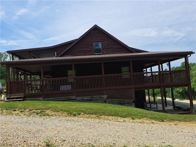 view of side of home with a wooden deck