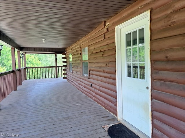 wooden deck featuring a porch