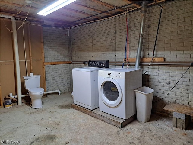 laundry room with washer and dryer