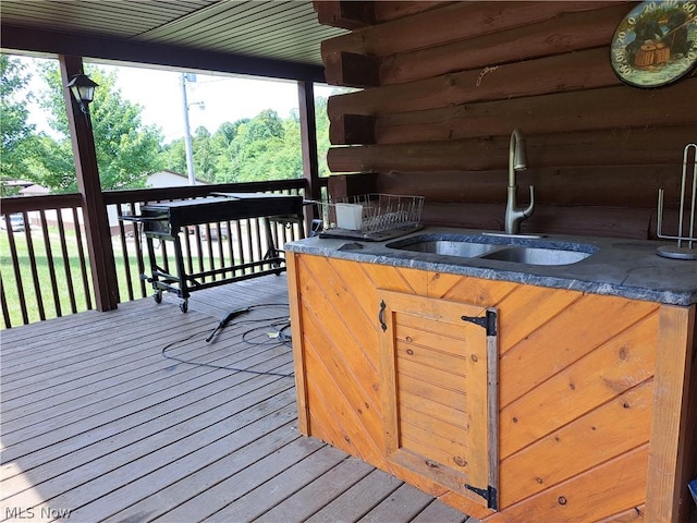 wooden terrace featuring sink