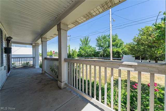 balcony featuring a porch