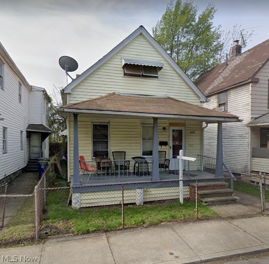 bungalow-style home with a porch