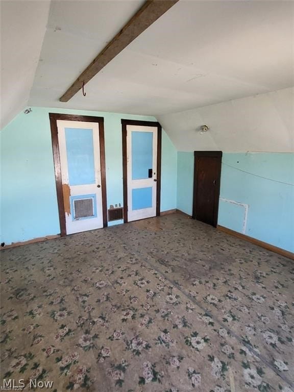 bonus room with vaulted ceiling