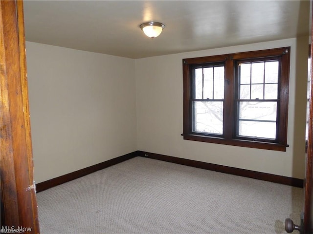 view of carpeted spare room