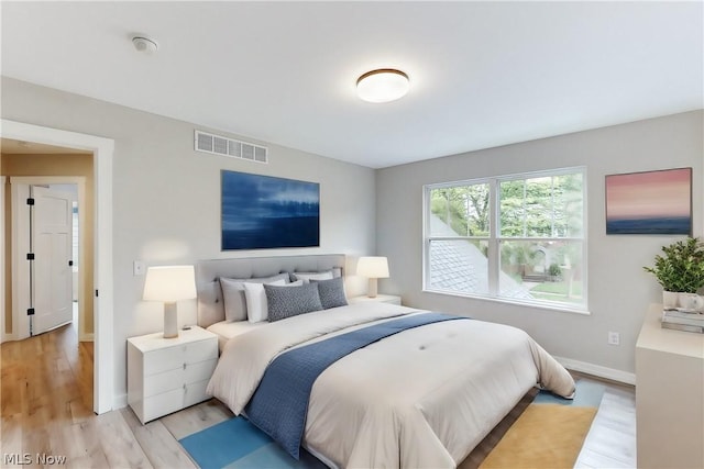 bedroom featuring light hardwood / wood-style flooring