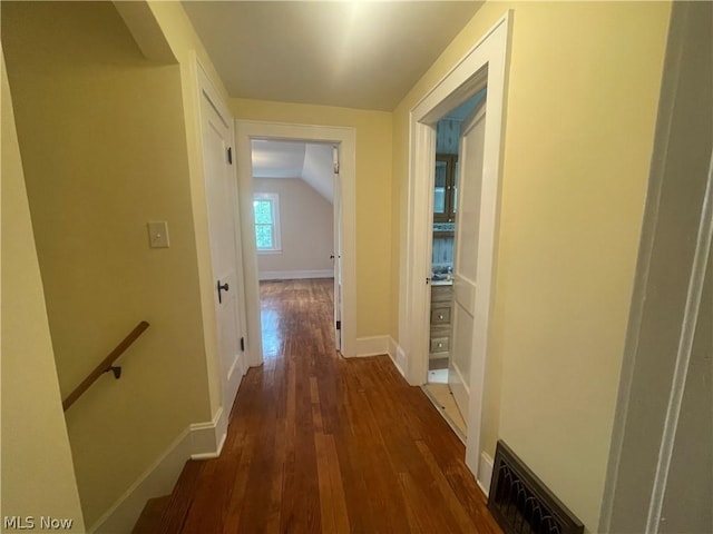 hallway featuring dark hardwood / wood-style flooring