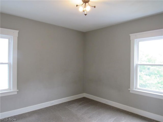 empty room with carpet floors