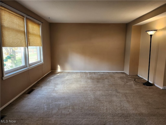 view of carpeted spare room