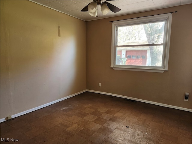 spare room featuring ceiling fan