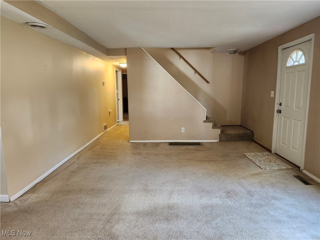 basement with light carpet