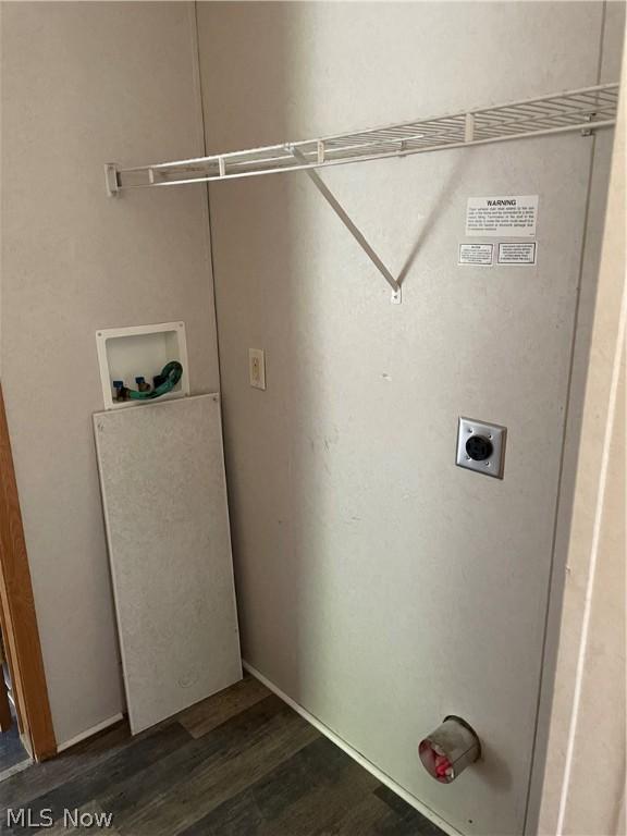 laundry room with electric dryer hookup, dark wood-type flooring, and hookup for a washing machine