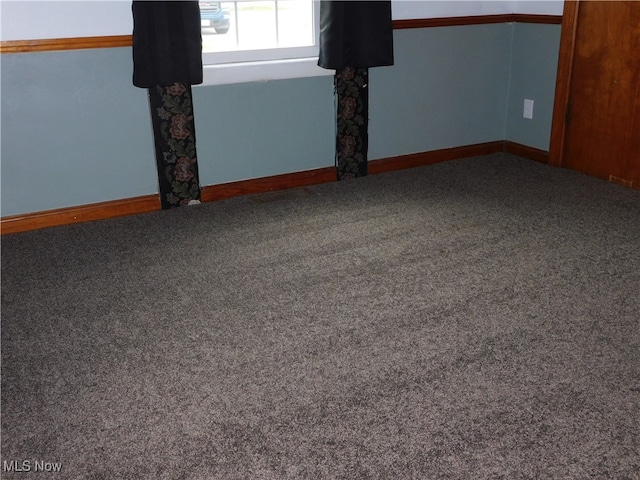 view of carpeted spare room