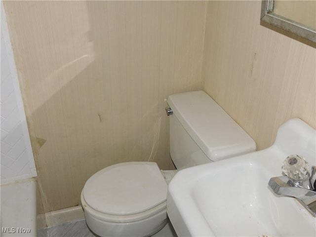 bathroom featuring toilet