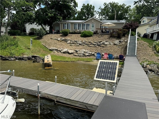 view of dock with a water view