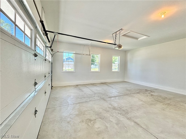 garage featuring a garage door opener