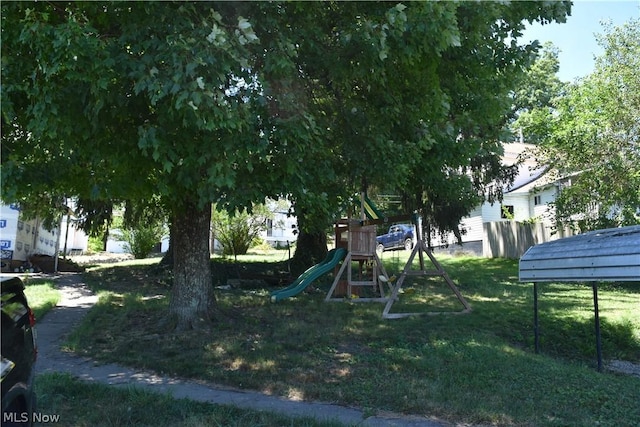 view of jungle gym with a yard