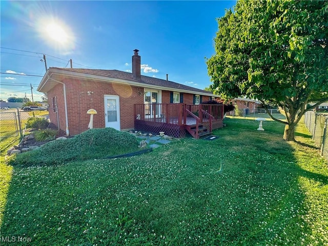 304 Stone Rd, Belpre, OH 45714 - back of property with a yard and a deck