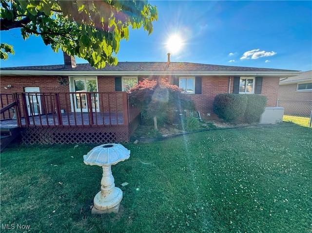 304 Stone Rd, Belpre, OH 45714 - view of front of home featuring a front yard and a wooden deck