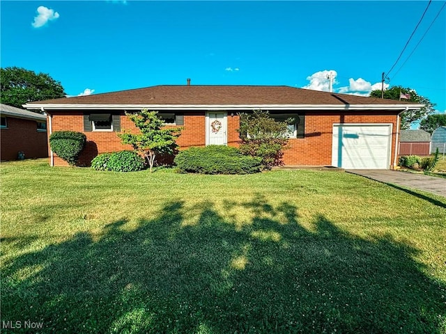 ranch-style home with a garage and a front yard