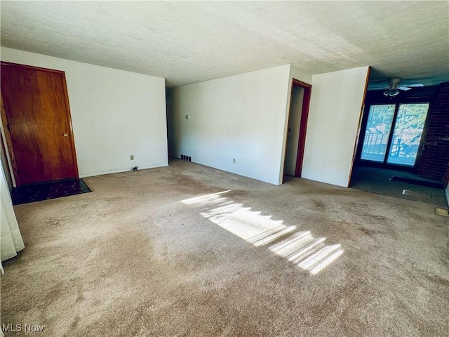 304 Stone Rd, Belpre, OH 45714 - interior space with ceiling fan, light colored carpet, and a textured ceiling