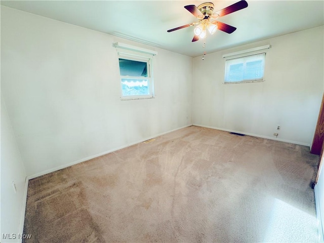 304 Stone Rd, Belpre, OH 45714 - empty room with light carpet and ceiling fan