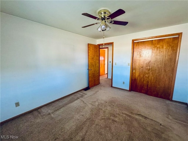 304 Stone Rd, Belpre, OH 45714 - unfurnished bedroom with ceiling fan, light colored carpet, and a closet
