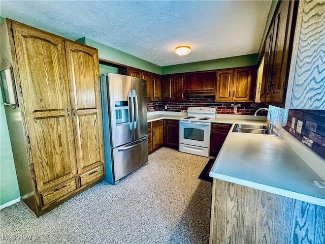304 Stone Rd, Belpre, OH 45714 - kitchen with stainless steel fridge with ice dispenser, electric range, sink, and a textured ceiling