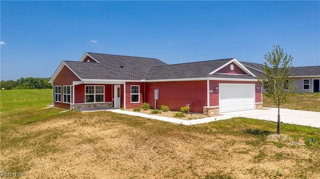 single story home with a garage and a front lawn