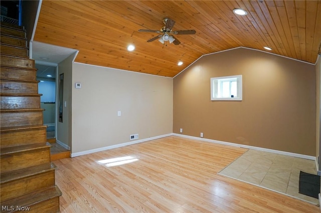 additional living space with light hardwood / wood-style floors, wooden ceiling, ceiling fan, and vaulted ceiling